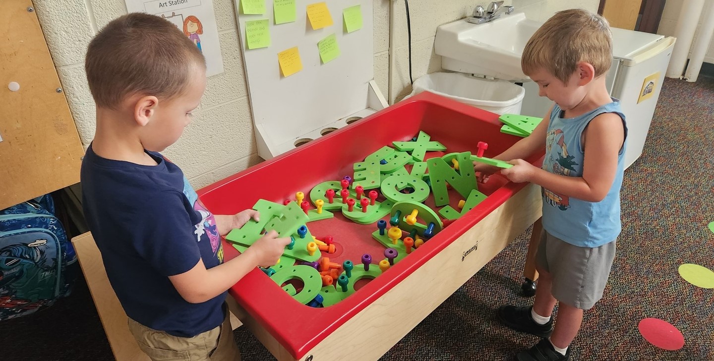 Early Learning Center students work on their alphabet