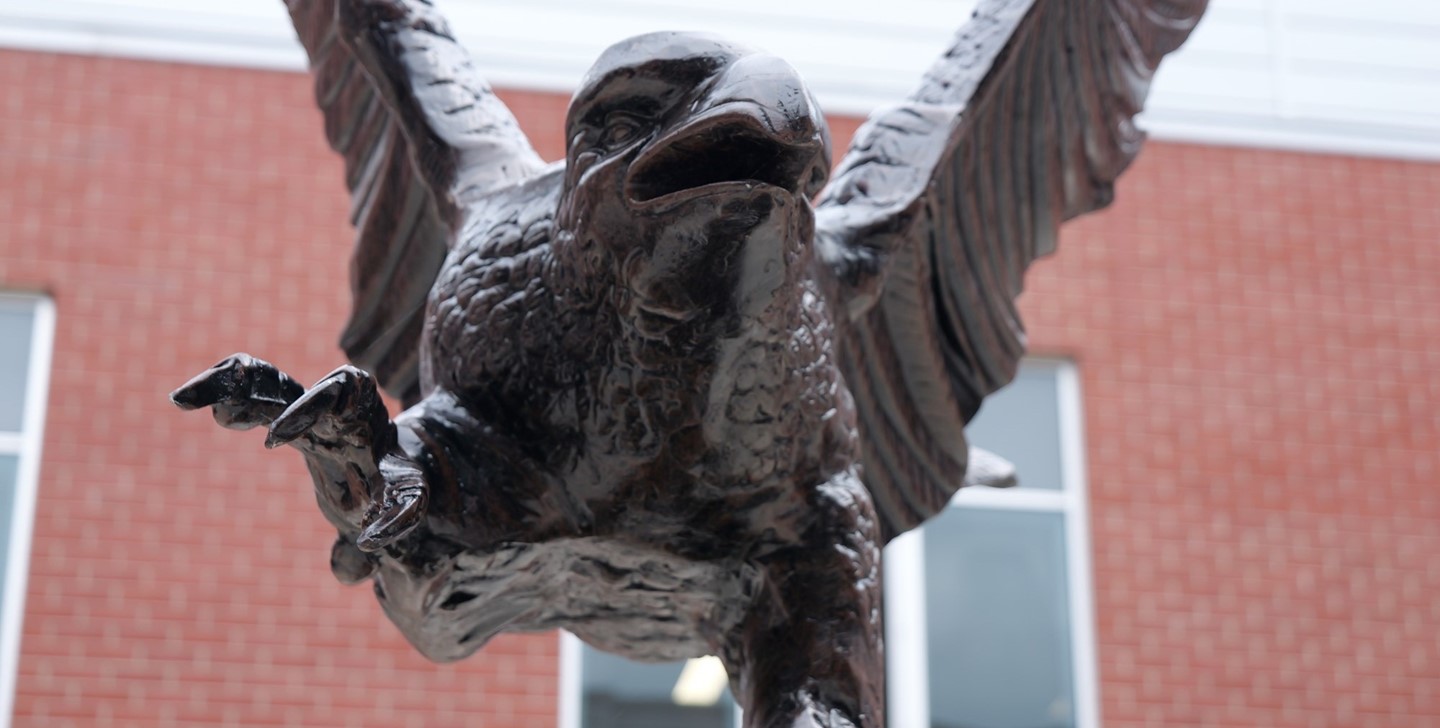 Closeup of Eagle statue in High School courtyard