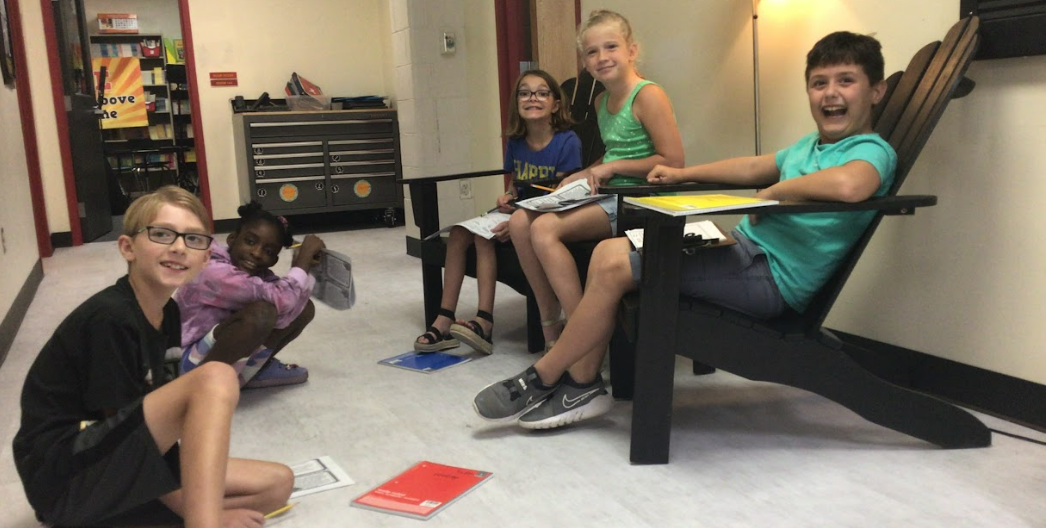 Big Walnut Elementary students sitting in the hallway