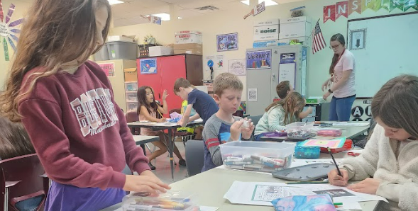 Students coloring in a class at Hylen Souders Elementary