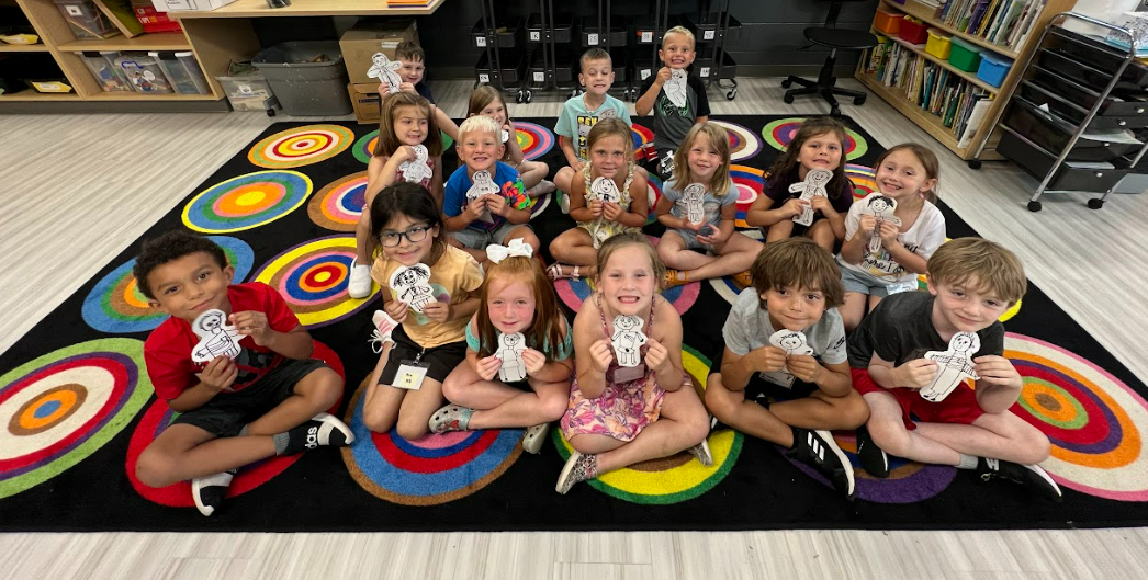 Students showing off their art