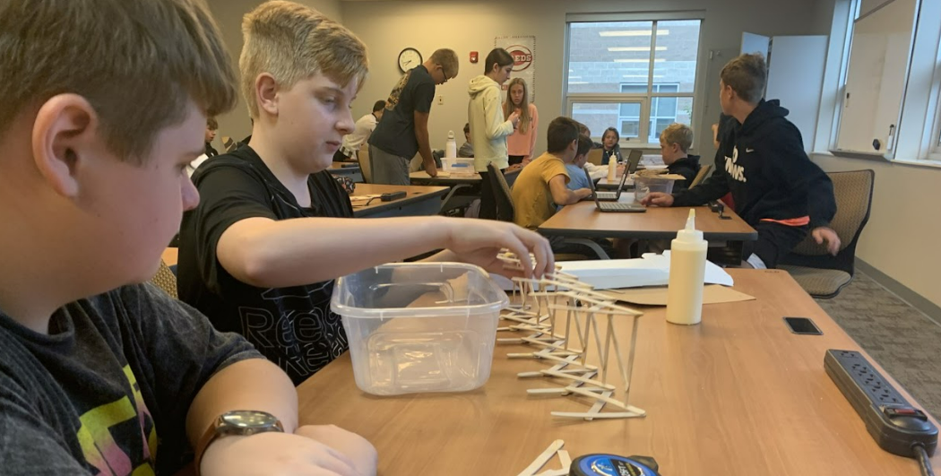 Students building a model bridge at Big Walnut Middle School