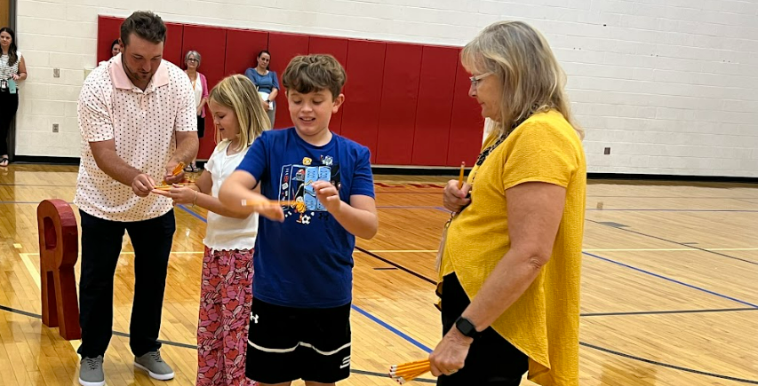 Teachers help students at the first RISE event at Big Walnut Intermediate School