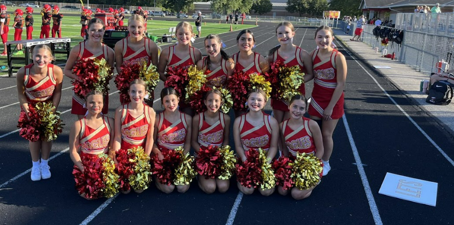 Big Walnut Middle School cheerleaders at a football game