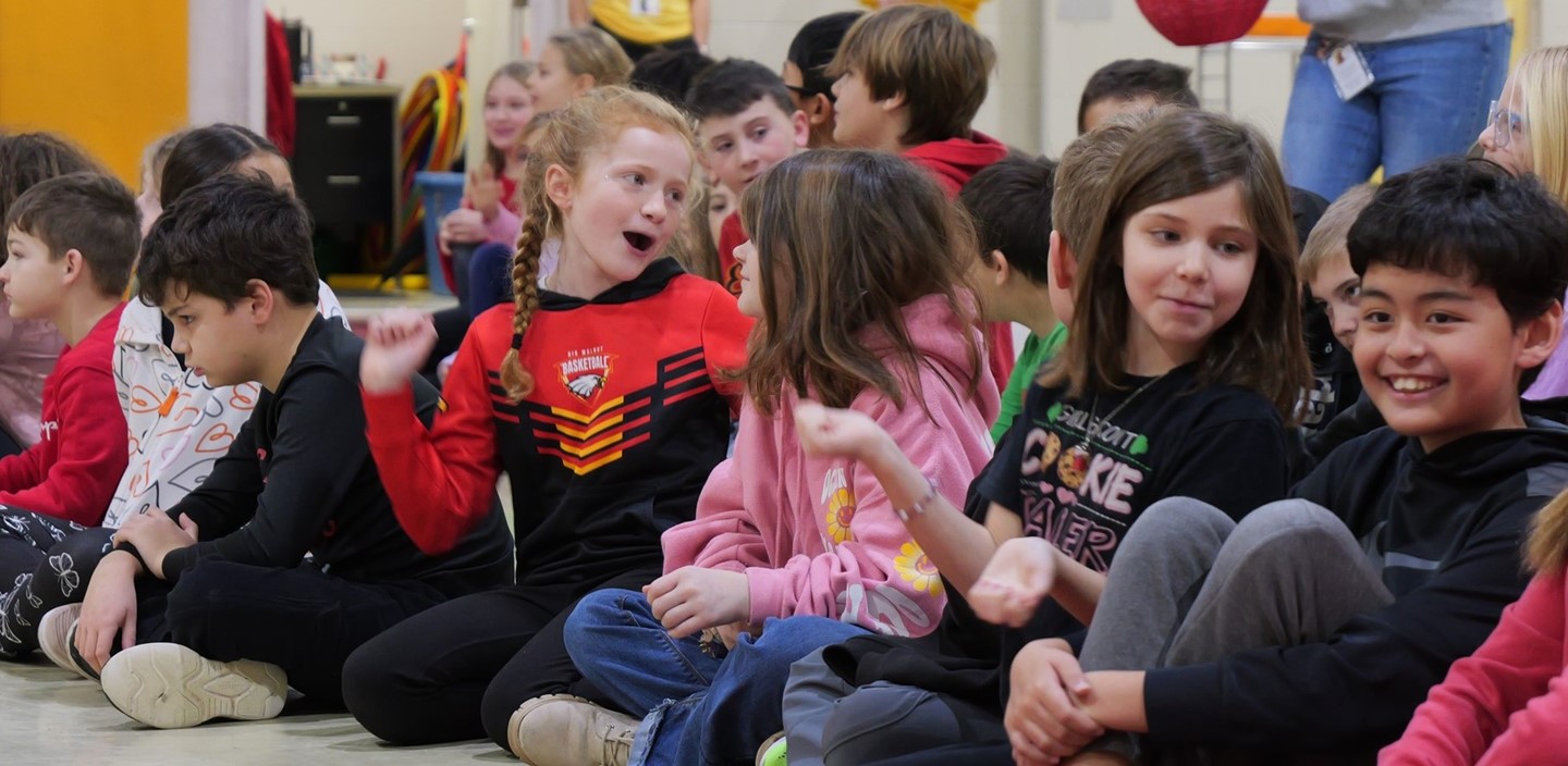 Students in an assembly crowd at Big Walnut Elementary