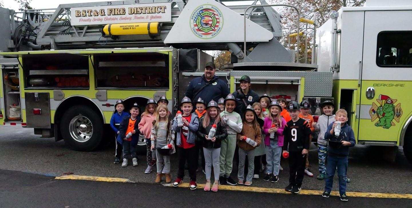Big Walnut Elementary students pose with BST&G Fire District firefighters
