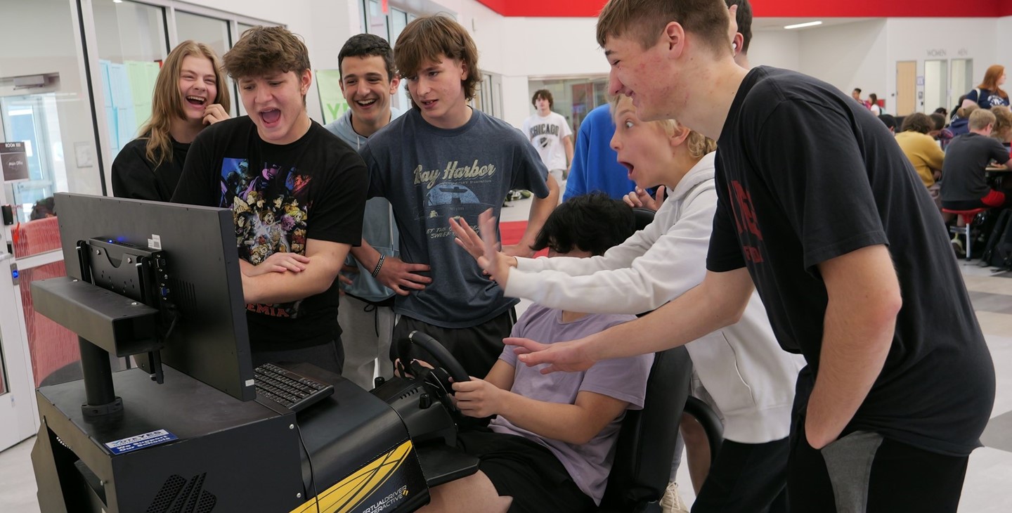 Big Walnut High School students play a Distracted Driving Simulator