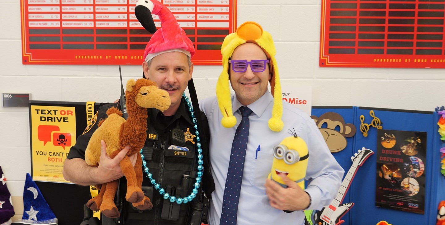Principal Hersh and SRO Snyder pose for a silly picture