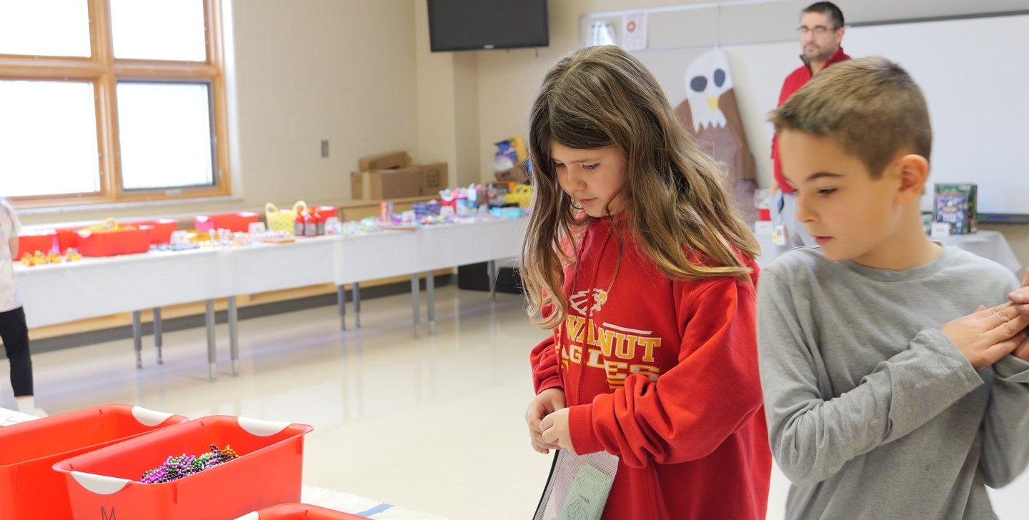 Student go shopping with their &#34;Eagle Bucks&#34;