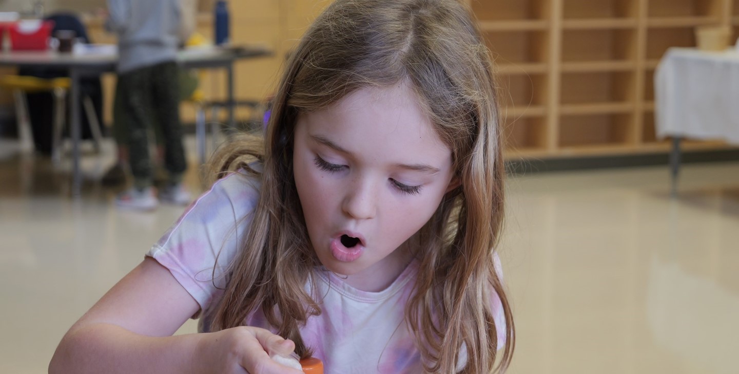 A student is surprised by what she finds