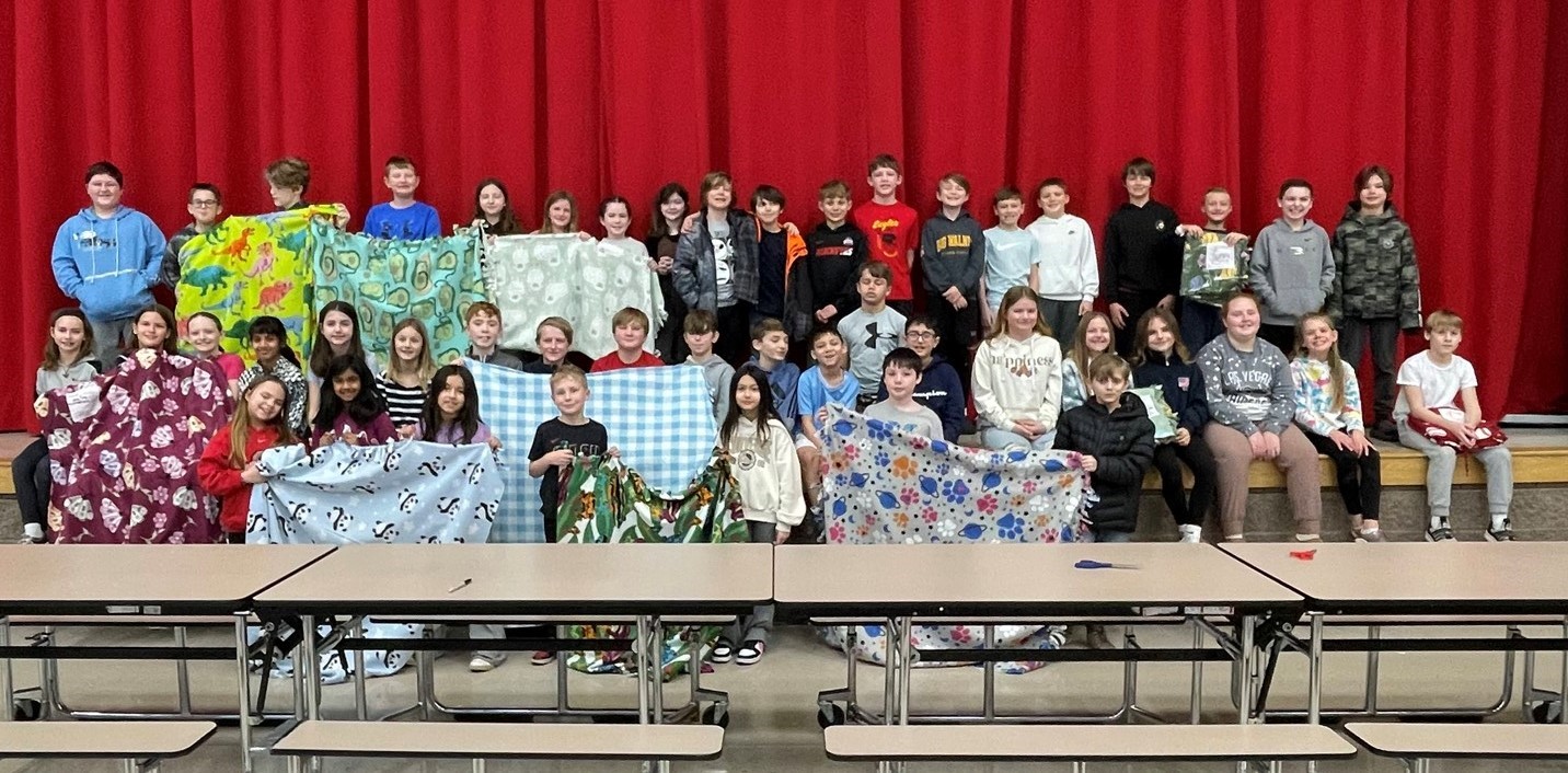BWI students show off their blankets for kindness