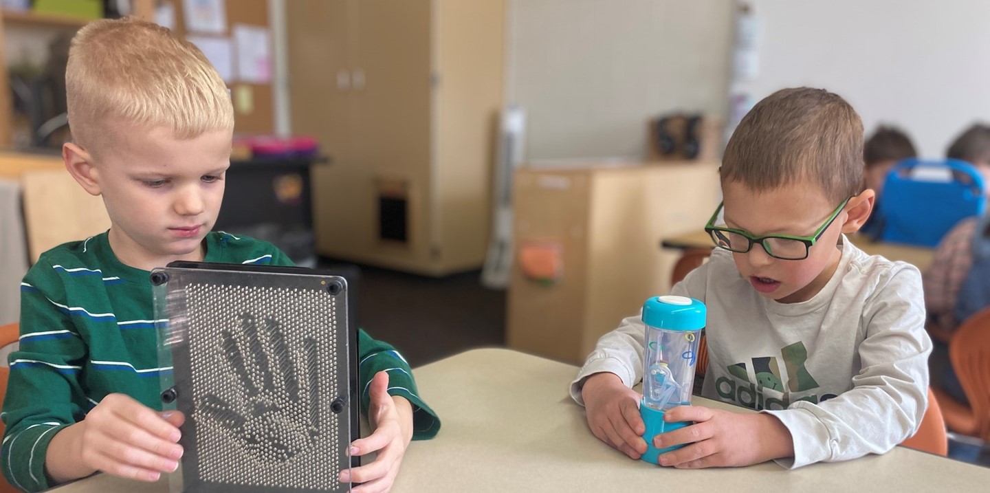 ELC students play with toys